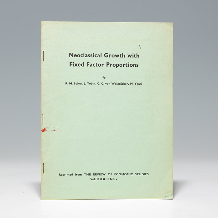 Neoclassical Growth with Fixed Factor Proportions