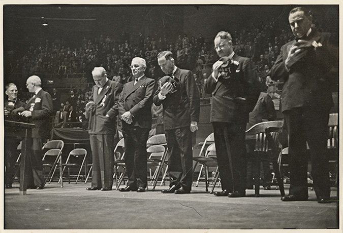 Copy-print of Harry Truman listening to National Anthem